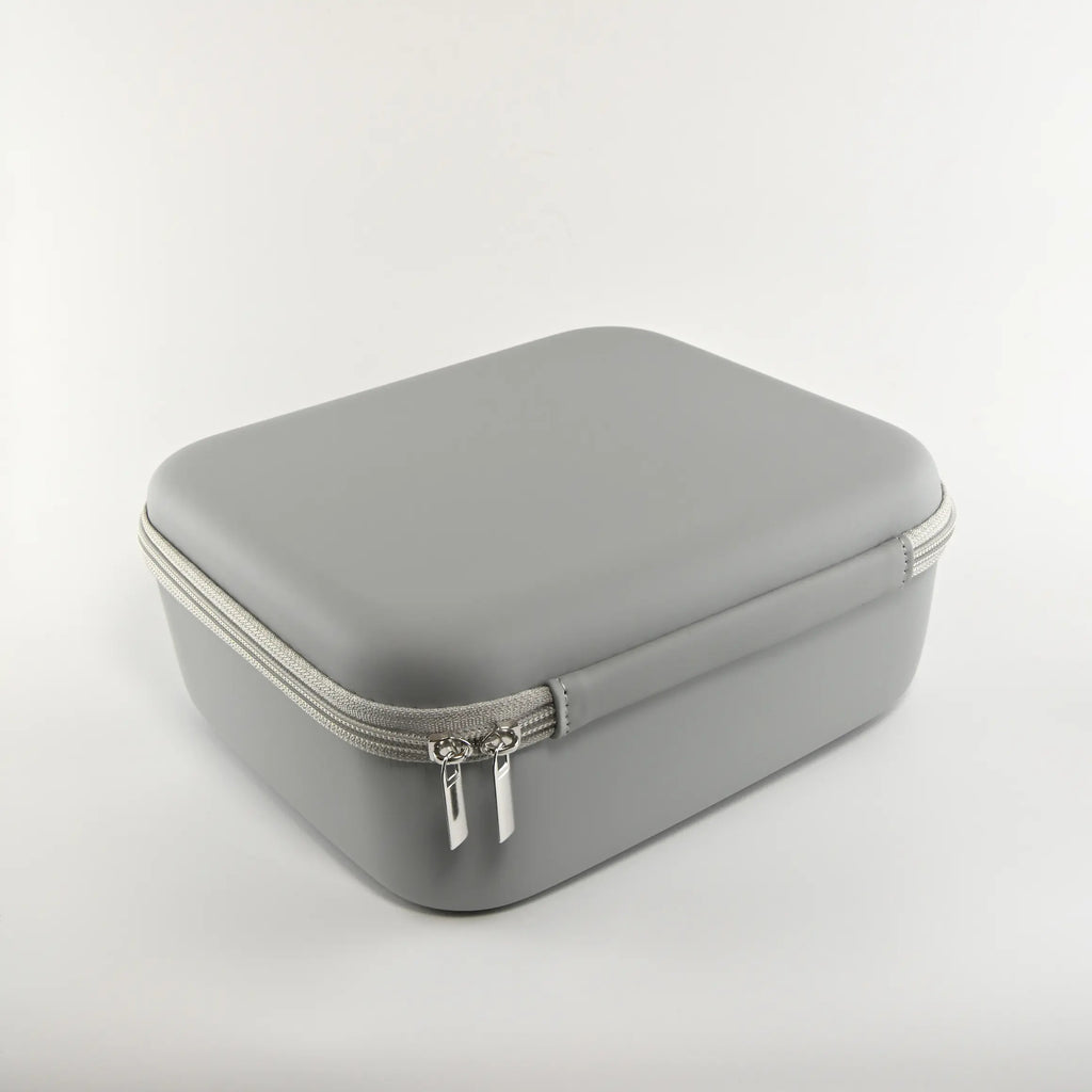 Grey zip carrying case for the home laser therapy device