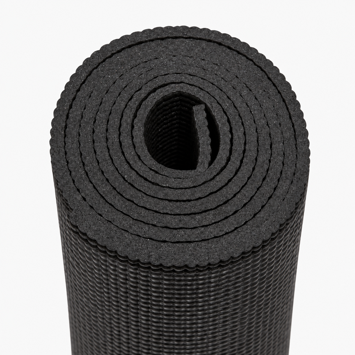 Black non-slip yoga mat — close-up of textured grip surface